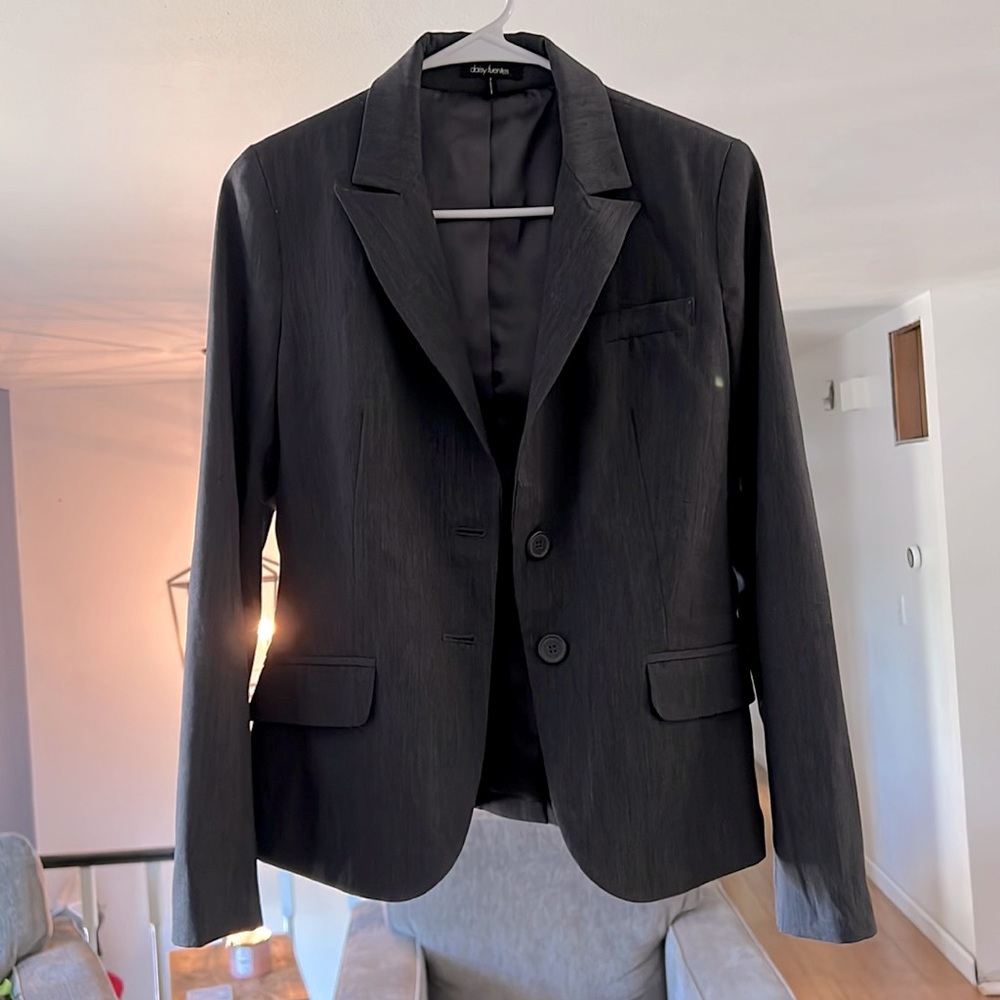 Dark grey size 2 woman’s blazer.
